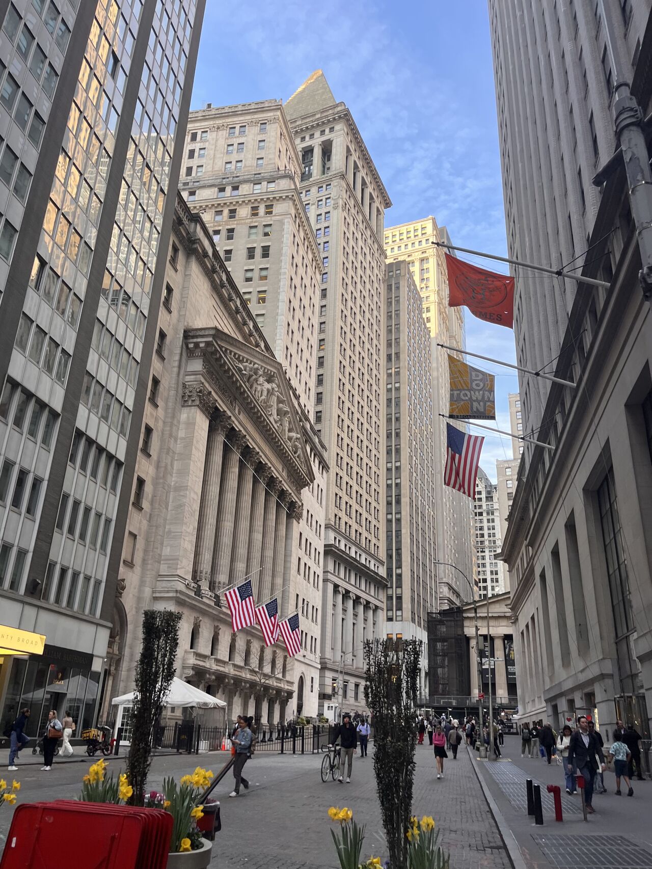 Wall Street in downtown Manhattan, where global capital and partnerships converge